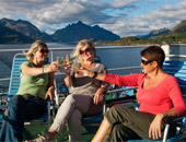 Guests enjoying a drink on a Hurtigruten Norwegian Coastal Express cruise ship